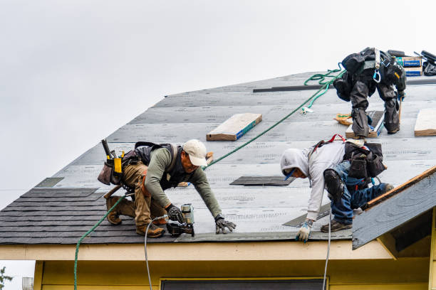 Professional Gutter Installation technician working in Lee, NH